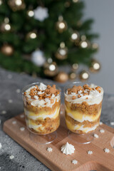 Pastries with caramel in transparent cups on the table