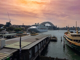 Sydney Harbour Australia at Sunset, lovely coloured skies boats ferries cruise liners houses and...