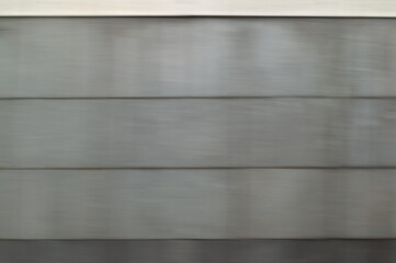 abstract background with a gray wall. motion blur.