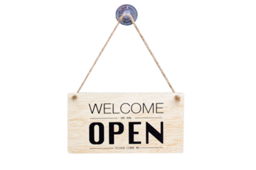 Text on vintage black sign "Come in we're open" isolated on white background,With clipping path
