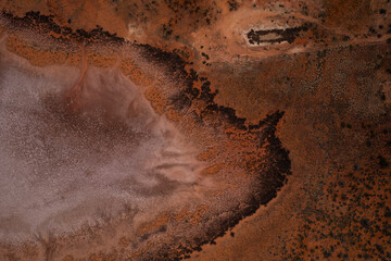 Aerial view looking down of a salt lake in the Northern Territory red centre