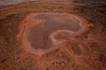 Aerial view of an Australia shaped salt lake in the Northern Territory
