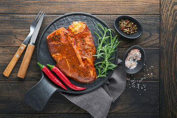 Raw steak t-bone or porterhouse. Steak t-bone or porterhouse in sauce with spices, salt and...