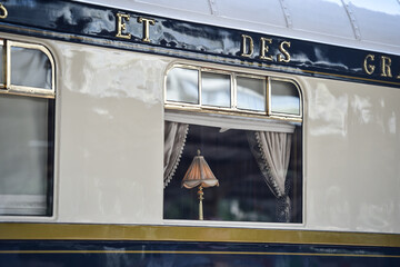 Famous Orient Express long distance passenger train stopped in Bucharest central train station. - 531400309