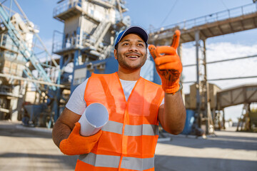 Photo of happy male multiethnic worker in plant