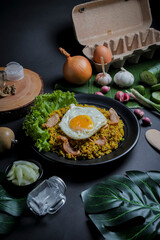 Fried Rice or Nasi Goreng from Indonesia with Egg Yolk, Spices and Seasoning Composition