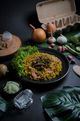 Fried Rice or Nasi Goreng Indonesian Food with Beef, Seasoning and Spices Isolated