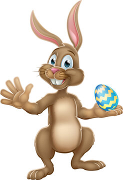 Easter Bunny Rabbit Holding Chocolate Egg