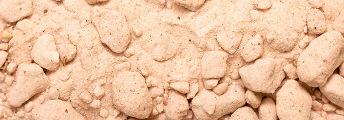Himalayan pink salt close-up on a white background flat lay. Dry herbs as seasoning. Indian and Arabic spices for cooking. Medicinal herbs and condiment.