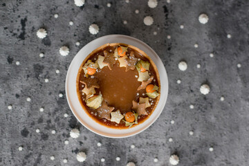 Sweet cheesecake with caramel on the table