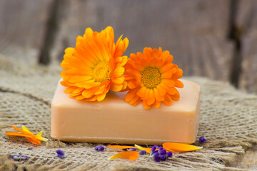 Obraz na płótnie Canvas Natural handmade soap with calendula (pot marigold)