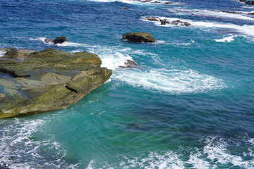 Waves crushing the rocks on the beach