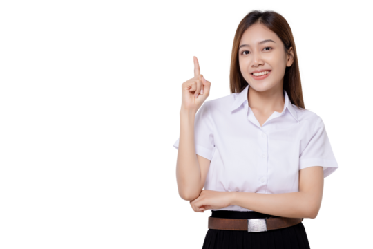 Portrait smiling of teen student girl of Asian ethnicity in university uniform pointing finger away on copy space. PNG file transparent background.