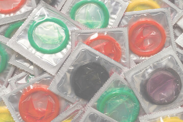 Colorful condoms background.