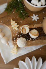 Sweets with coconut sprinkles on the table