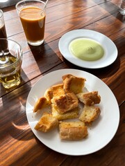 steamed toast on wooden dining table in Chiang Mai, Thailand