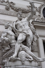 copper statue of a naked man in Vienna