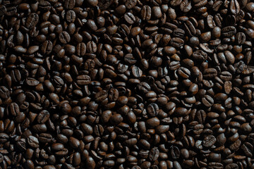 Background of fresh roasted coffee beans, close up, top view