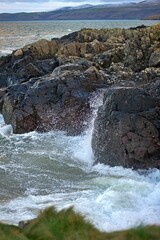 Fototapeta premium Rocks and waves at Corsewell Point near Stranraer Dumfries and Galloway in winter
