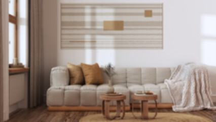 Blurred background, vintage living room, rattan furniture, parquet floor and wallpaper. Farmhouse interior design