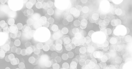 Blurred background silver glitter shiny sparkling banner. Happy Holidays background for white...