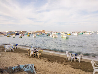 Fototapeta na wymiar Small fishing boats at the Bahary Beach in Mediterranean Sea of Alexandria, Egypt