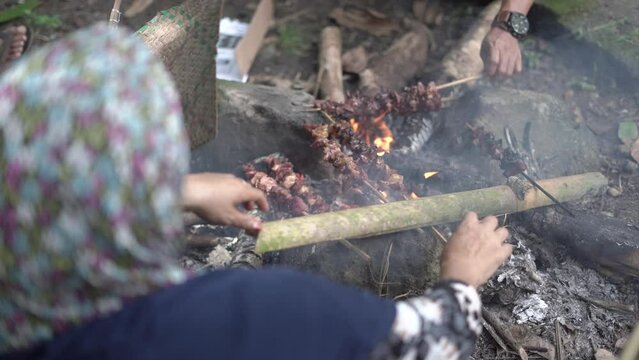 eid al adha celebration grilling satay. Indonesian food