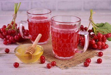 Vitamin juice from viburnum berries with honey.
