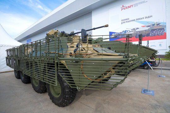 MOSCOW REGION, RUSSIA - AUGUST 19, 2022: BTR-82AT armored personnel carrier with a complex of protective lattice screens. Exhibit of the international military-technical forum "Army-2022"