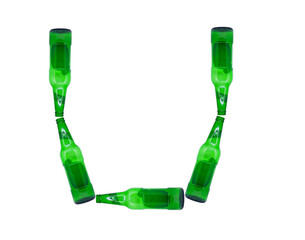 The letter U is made of glass bottles