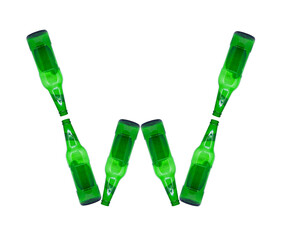 The letter W is made of glass bottles