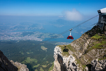 Close up of gondola with Lucerne in the background from Mount Pilatus Switzerland