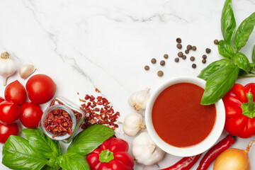 Ingredients for tomato sauce. Culinary background with spices and tomato sauce.