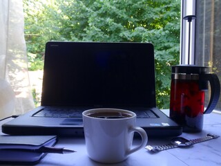cup of coffee and laptop