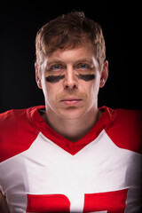 Male American football player with no helmet. © Carl