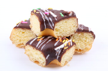 Chocolate sweet mini donuts on white background