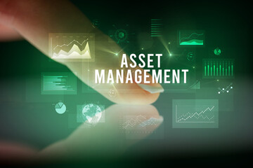 Finger touching tablet with business graphs and icons concept