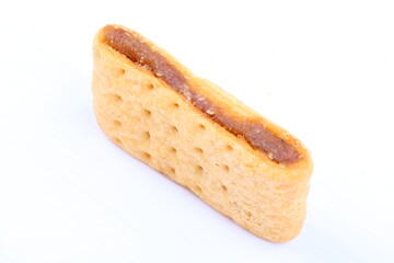 Butter cracker with pineapple jam isolated on the white background