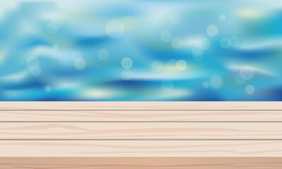 Fototapeta na wymiar Empty wooden table and blurred background of sea.