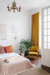 Bohemian style bedroom in cozy retro apartment