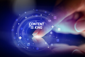 Finger touching tablet with social media icons concept