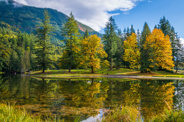 Autumn forest on the riverside, marvel at amazing views of the Silver Lake. Silver Lake Campground, Fall Time, North Cascades Region