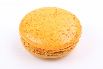 Yellow macaron isolated in white background