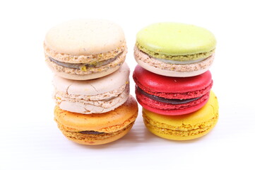 Colorful macarons isolated on white background