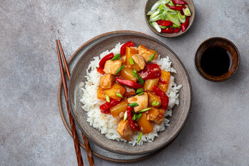 Sweet ad sour chicken served with steamed rice