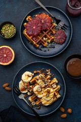 waffles with red blood oranges and banana, nuts and salted  caramel sauce