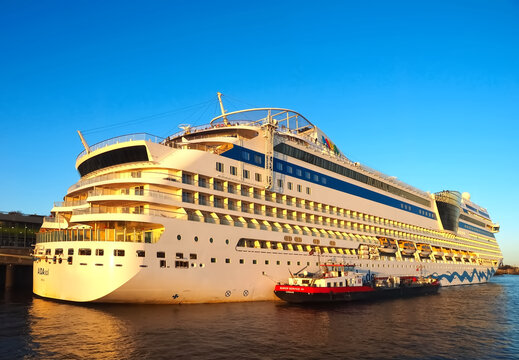Cruise ship Aida Sol in Hamburg in golden evening light