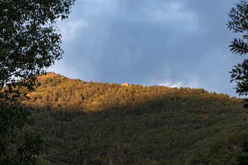 shelter of shepherds in a forest of the Aragonese Pyrenees at sunset
