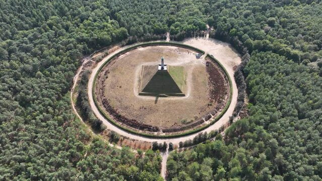 The Pyramid of Austerlitz monument consisting of a grass clad pyramid shaped sand mound stone obelisk. Utrecht municipality of Woudenberg. Aerail drone overview panorma platform.