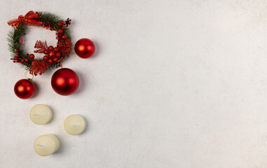 Red Christmas Balls with candles on a light background. Selective Focus. Space for copying. view from above.